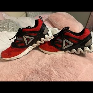 Boys red Reebok zig tech sz 4y
